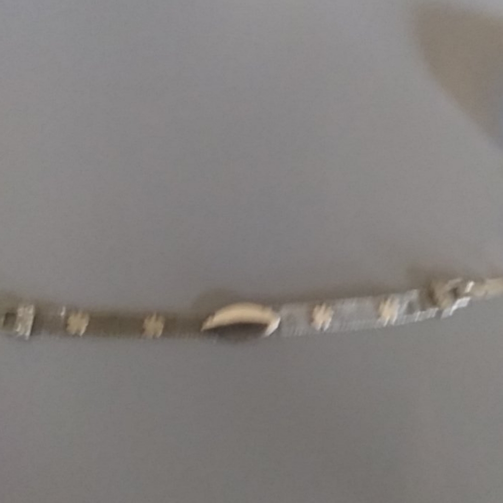 Silver four leaf clover mesh bracelet